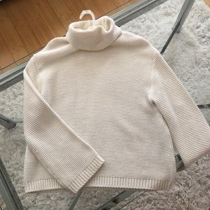 White knit turtle neck sweater